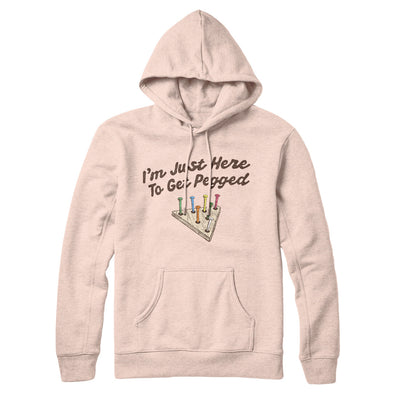 I'm Just Here To Get Pegged Hoodie Pale Pink | Funny Shirt from Famous In Real Life