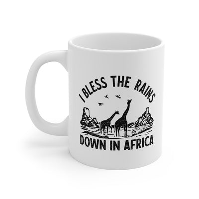 I Bless The Rains Down In Africa Coffee Mug 11oz | Funny Shirt from Famous In Real Life